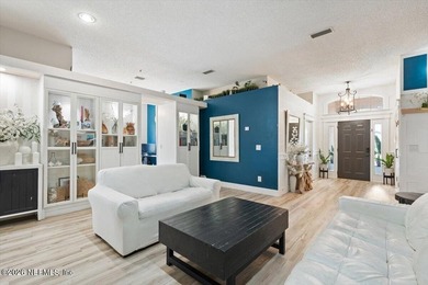 Set on a peaceful waterfront lot in the gated community of The - photo 15
