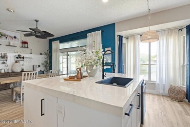 Set on a peaceful waterfront lot in the gated community of The - photo 21