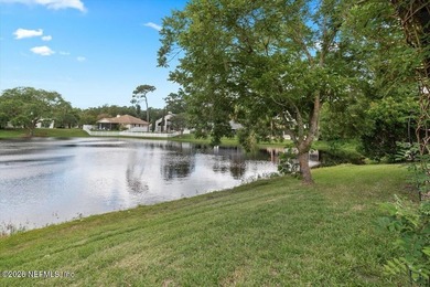 Set on a peaceful waterfront lot in the gated community of The - photo 36