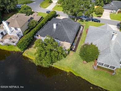 Set on a peaceful waterfront lot in the gated community of The - photo 38