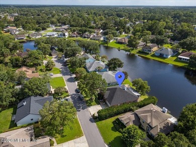 Set on a peaceful waterfront lot in the gated community of The - photo 40