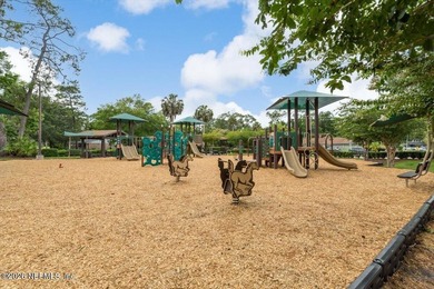 Set on a peaceful waterfront lot in the gated community of The - photo 45