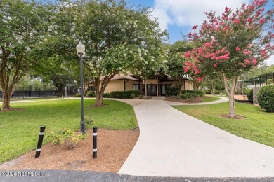 Set on a peaceful waterfront lot in the gated community of The - photo 47