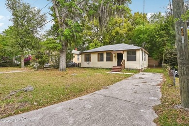 From the curb, it's a 1944 cottage. Walk through the front door - photo 3