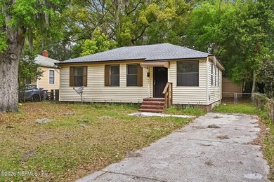 From the curb, it's a 1944 cottage. Walk through the front door - photo 4