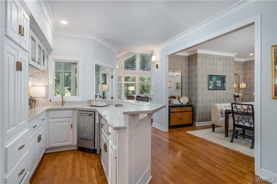 Nestled on a private 2.41-acre lot with an additional 1.51-acre