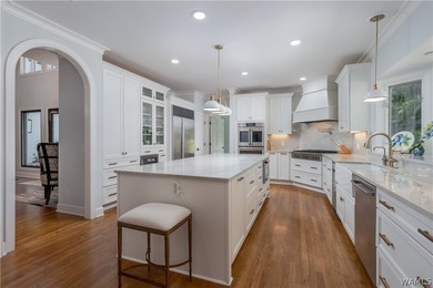 Nestled on a private 2.41-acre lot with an additional 1.51-acre