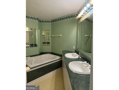 This metal roofed octagon home is in a protected cove off the - photo 18