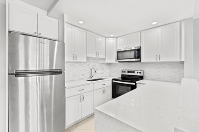 Beautifully Updated Ground Floor Unit. 1 Bedroom, 1 1/2 Baths - photo 4