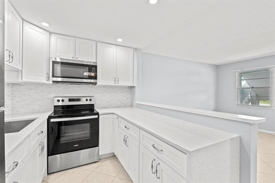 Beautifully Updated Ground Floor Unit. 1 Bedroom, 1 1/2 Baths - photo 5