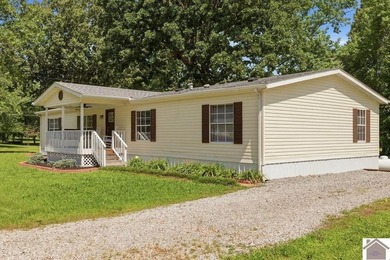Enjoy lake living in this spacious 4 bedroom, 2 bath home - photo 1