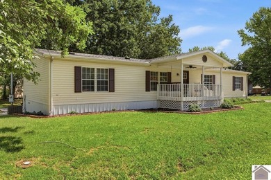 Enjoy lake living in this spacious 4 bedroom, 2 bath home - photo 2