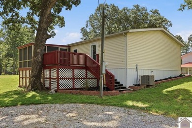 Enjoy lake living in this spacious 4 bedroom, 2 bath home - photo 5