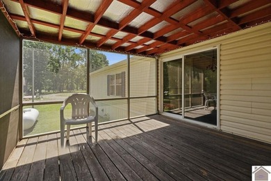 Enjoy lake living in this spacious 4 bedroom, 2 bath home - photo 7