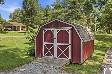 Enjoy lake living in this spacious 4 bedroom, 2 bath home - photo 8