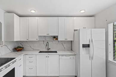 Spacious 2BR/2BA ground-floor partially furnished unit with - photo 2