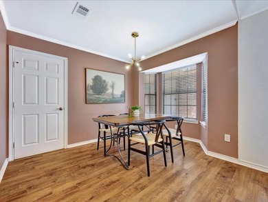 Crown Colony gem! This inviting 3-bedroom, 2-bath home sits on a - photo 14