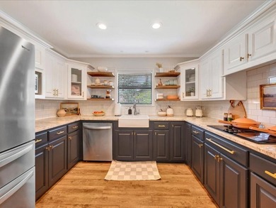Crown Colony gem! This inviting 3-bedroom, 2-bath home sits on a - photo 18