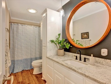 Crown Colony gem! This inviting 3-bedroom, 2-bath home sits on a - photo 21
