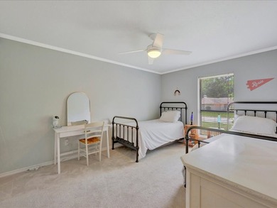 Crown Colony gem! This inviting 3-bedroom, 2-bath home sits on a - photo 25