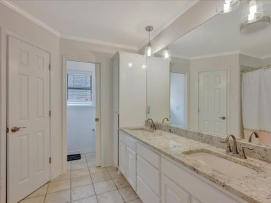 Crown Colony gem! This inviting 3-bedroom, 2-bath home sits on a - photo 26