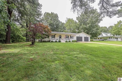 Discover peaceful lake area living at this home in Gilbertsville - photo 3