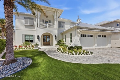 Set within the gated enclave of Palm Island, this exceptional - photo 3