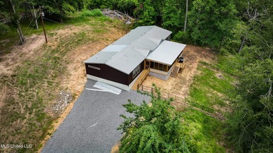 Hilltop Residence and new doublewide overlook a stocked lake and - photo 10