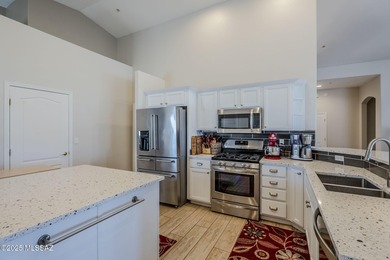 A stunning 2BR, 2.5BA, den, spacious 2.5 garage home with a