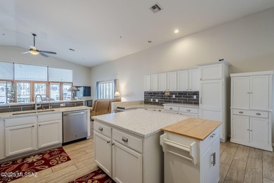 A stunning 2BR, 2.5BA, den, spacious 2.5 garage home with a