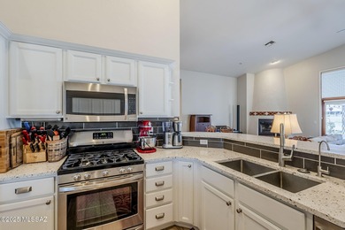 A stunning 2BR, 2.5BA, den, spacious 2.5 garage home with a