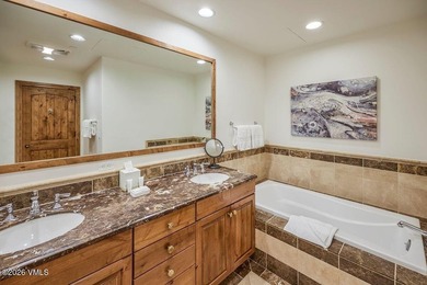 Perched on the top floor of one of Avon's most coveted slopeside - photo 18