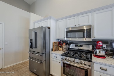 A stunning 2BR, 2.5BA, den, spacious 2.5 garage home with a