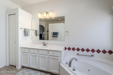 A stunning 2BR, 2.5BA, den, spacious 2.5 garage home with a