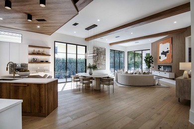 Step into this newly constructed residence that transcends the - photo 1