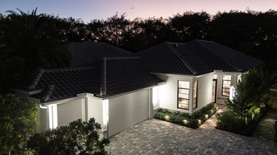 Step into this newly constructed residence that transcends the - photo 5