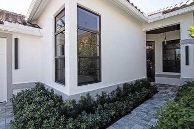 Step into this newly constructed residence that transcends the - photo 6