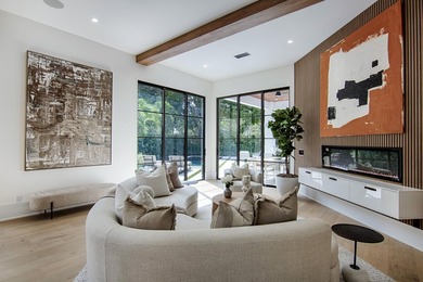 Step into this newly constructed residence that transcends the - photo 8