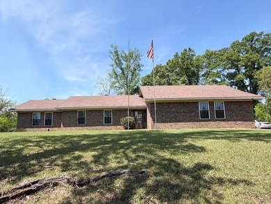 This house sets quietly on a hilltop with 19 acres surrounding - photo 1