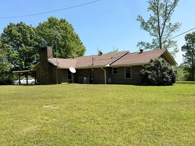 This house sets quietly on a hilltop with 19 acres surrounding - photo 3