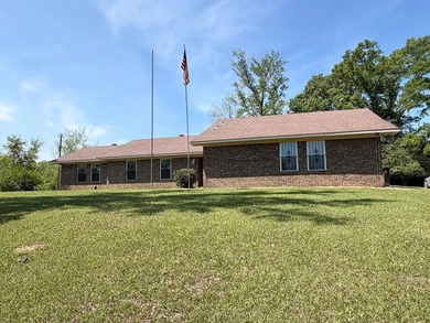 This house sets quietly on a hilltop with 19 acres surrounding - photo 4