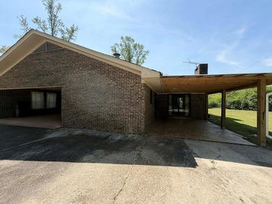 This house sets quietly on a hilltop with 19 acres surrounding - photo 9