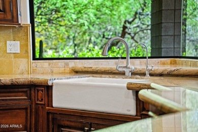 Tucked into a private Desert Mountain setting, this - photo 14