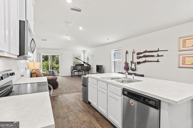 Welcome to Bartram Place! This 3-bedroom, 2-bath home offers a - photo 14