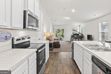 Welcome to Bartram Place! This 3-bedroom, 2-bath home offers a - photo 15