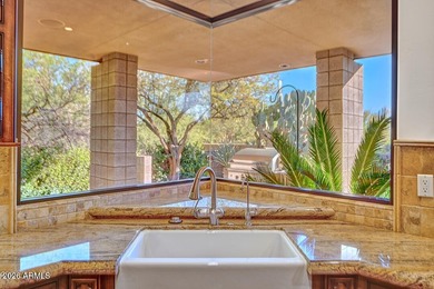 Tucked into a private Desert Mountain setting, this - photo 16