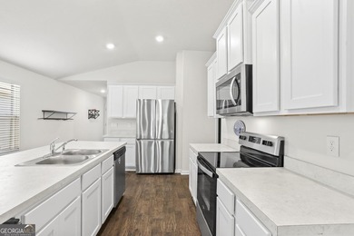 Welcome to Bartram Place! This 3-bedroom, 2-bath home offers a - photo 16