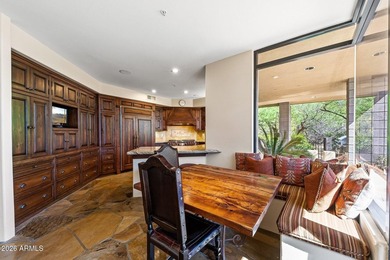 Tucked into a private Desert Mountain setting, this - photo 17