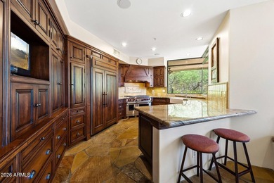Tucked into a private Desert Mountain setting, this - photo 19