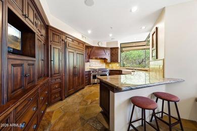 Tucked into a private Desert Mountain setting, this - photo 20
